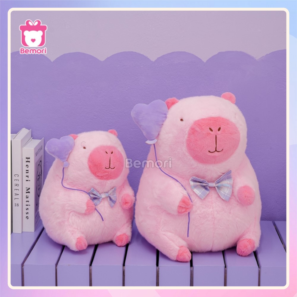 Gấu Bông Capybara Hồng Cầm Bóng Tim