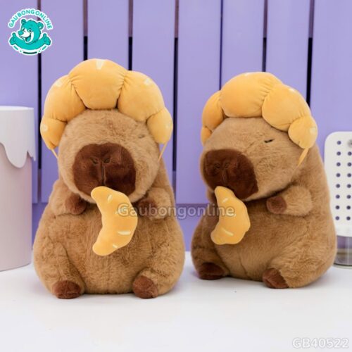 Gấu Bông Capybara Đội Bánh Sừng Bò