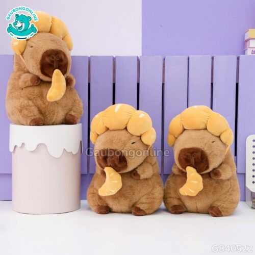 Gấu Bông Capybara Đội Bánh Sừng Bò