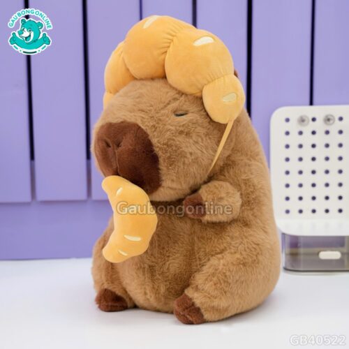Gấu Bông Capybara Đội Bánh Sừng Bò